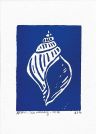 Blue linocut of a sea shell. The sea shell is white and around it is blue like the ocean.