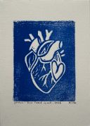 A blue linocut of heart within a heart. The heart is white, and all around is blue.